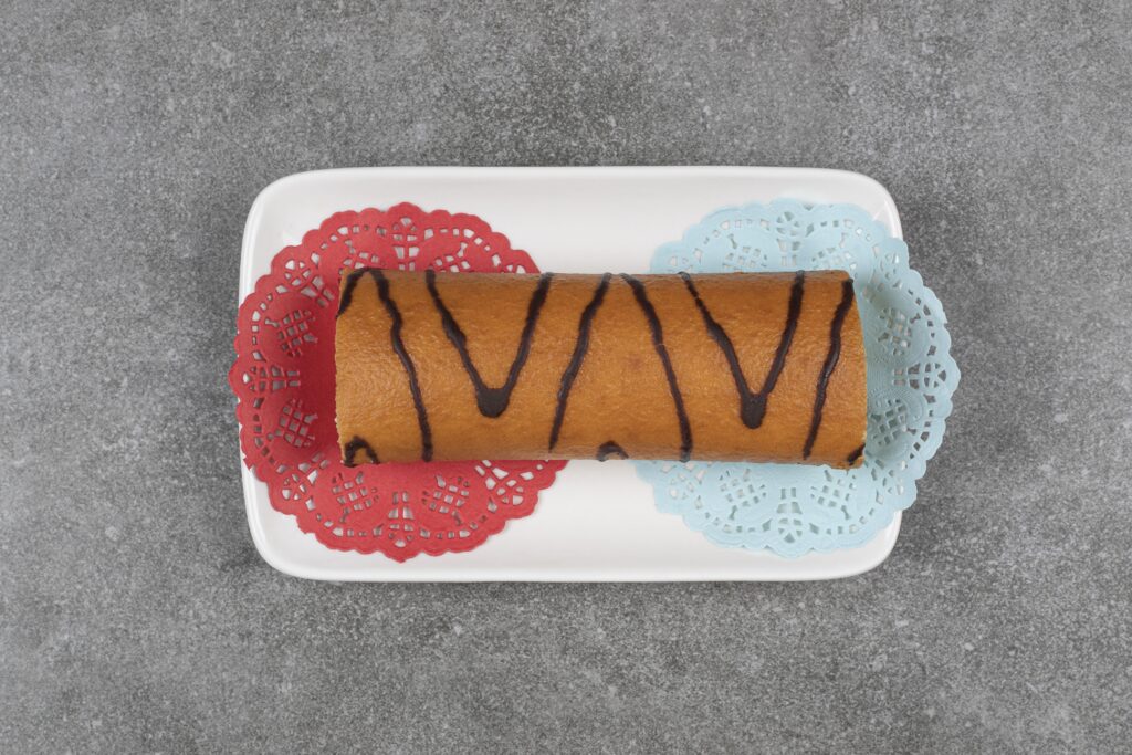 sweet-roll-cake-white-plate